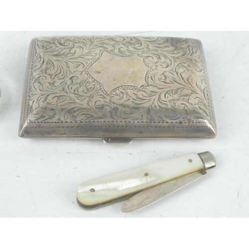 188 - A Sterling Silver engraved cigarette case, a Sterling silver and mother of pearl fruit knife and a s... 