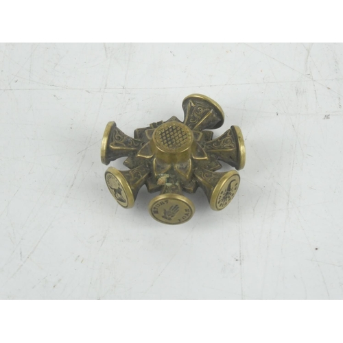 201 - An antique brass multi seal.