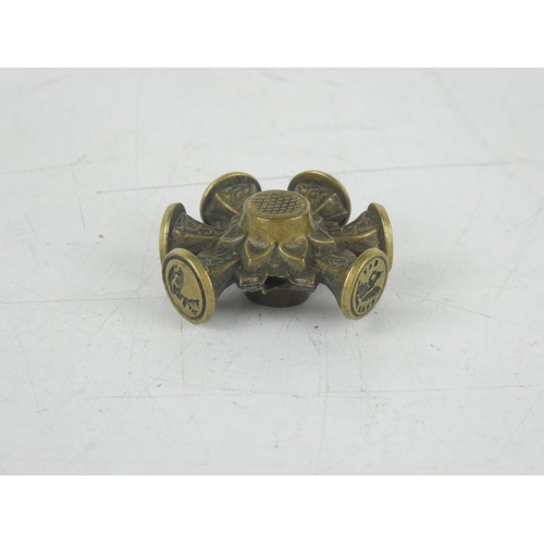 201 - An antique brass multi seal.