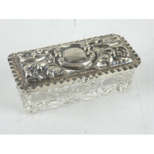 202 - An antique Sterling Silver lidded dressing table box.