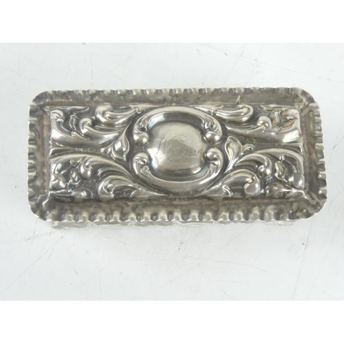 202 - An antique Sterling Silver lidded dressing table box.