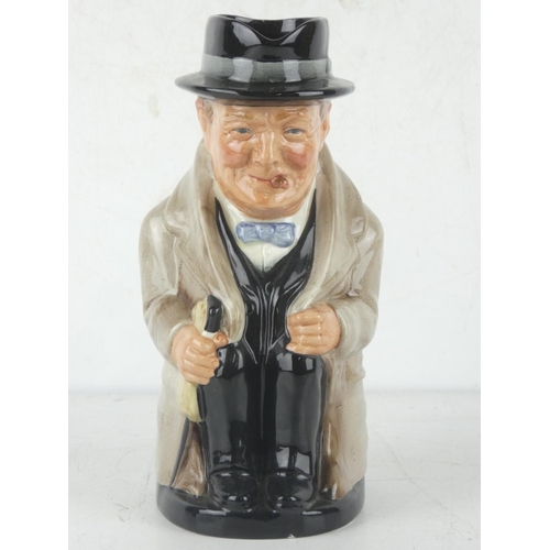 211 - A Royal Doulton 'Winston Churchill' mask jug, measuring 20cm.