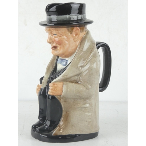 211 - A Royal Doulton 'Winston Churchill' mask jug, measuring 20cm.