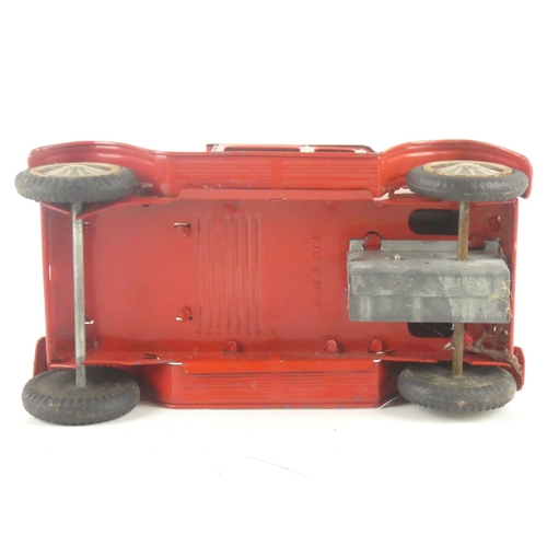 220 - A vintage tin plate clockwork toy car.