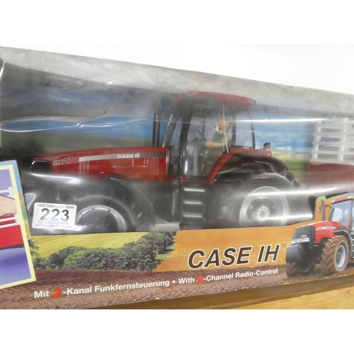 223 - A large boxed Dickie Case IH MX Magnum MX remote control tractor and trailer.