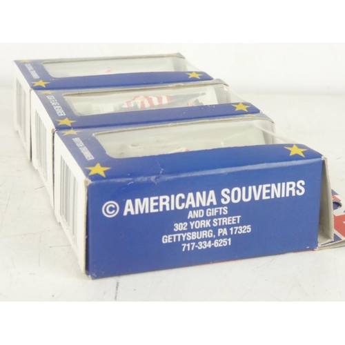 228 - Three boxed Americana Souvenirs hand painted figures 'USA Flag Bearer', 'Colonial Drummer' and 'Brit... 