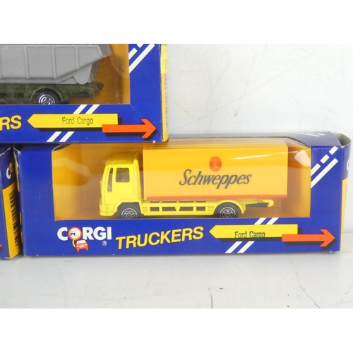 247 - Three boxed Corgi Truckers 'Ford Cargo'.