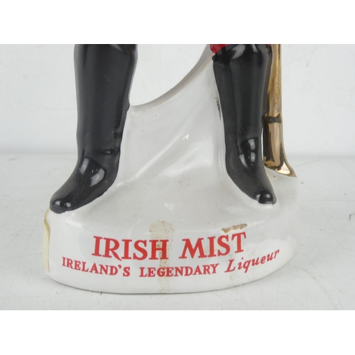 252 - An 'Irish Mist - Ireland's Legendary Liqueur' porcelain decanter, measuring 50cm, with original labe... 