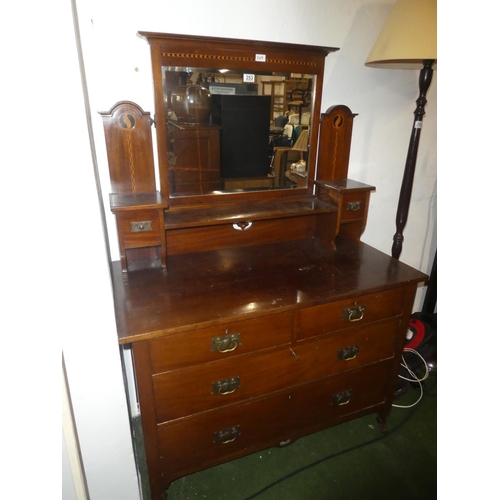 253 - An antique mahogany and inlay dressing table.