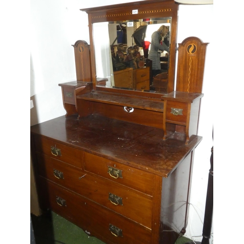 253 - An antique mahogany and inlay dressing table.