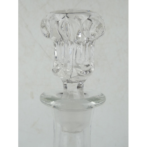 255 - A vintage lead crystal decanter and stopper.