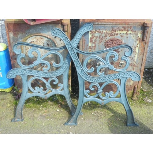 611 - A pair of garden seat ends.