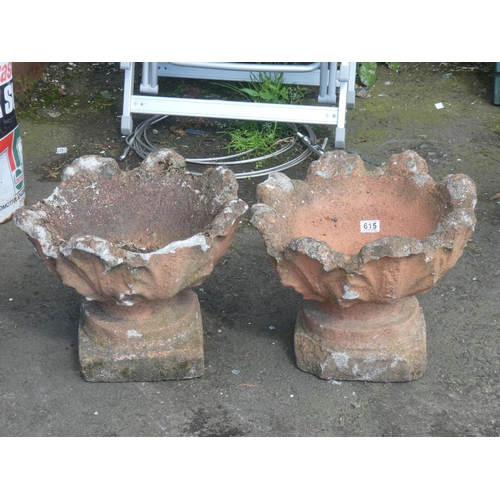 615 - A pair of concrete garden planters.