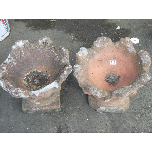 615 - A pair of concrete garden planters.