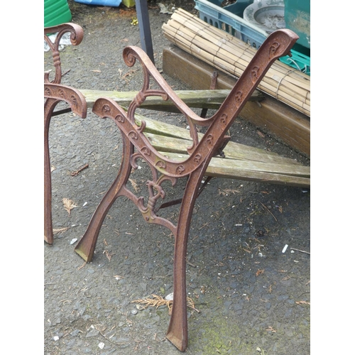 652 - A pair of garden seat ends for restoration.