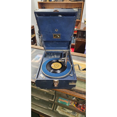 151 - A vintage portable gramophone in working condition.