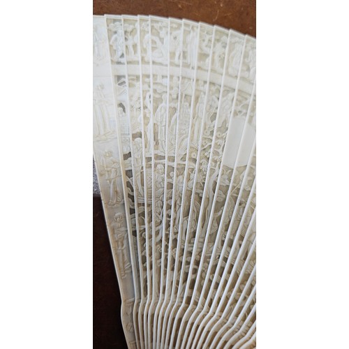 638 - A stunning Mid 19th Century Cantonese Brise hand fan, with decoratively carved bone segments (missin... 