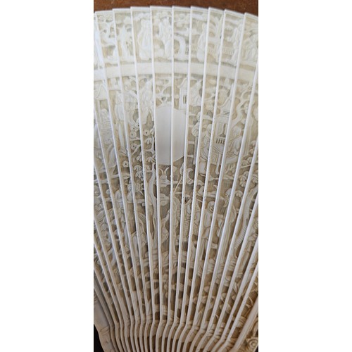 638 - A stunning Mid 19th Century Cantonese Brise hand fan, with decoratively carved bone segments (missin... 