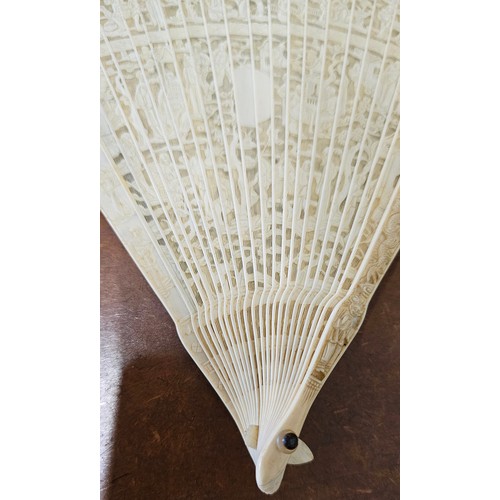 638 - A stunning Mid 19th Century Cantonese Brise hand fan, with decoratively carved bone segments (missin... 