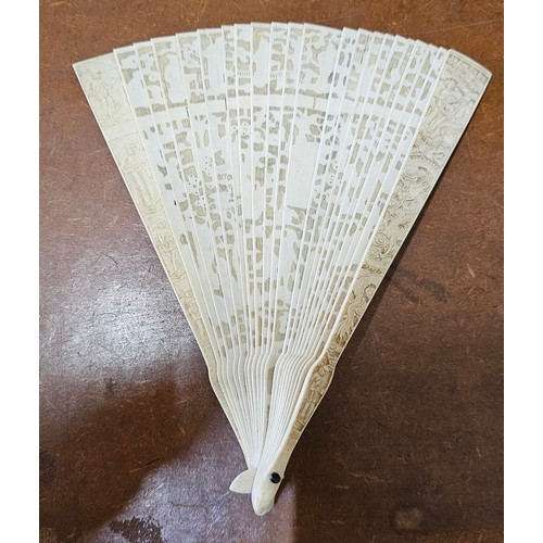 638 - A stunning Mid 19th Century Cantonese Brise hand fan, with decoratively carved bone segments (missin... 