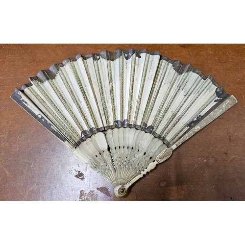 639 - A stunning early 18th Century hand fan, with beautiful hand painted leaf & carved bone segments.