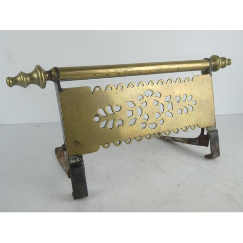 33 - An antique brass hanging trivet.