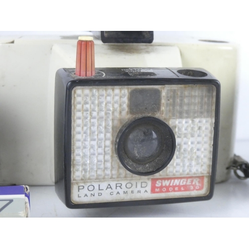 40 - A vintage Polaroid Land 'Swinger Model 20' camera and a Tammy 127 camera and a Samsung FF - 222 came... 