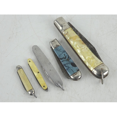 5 - A vintage Lark pen knife and four others.