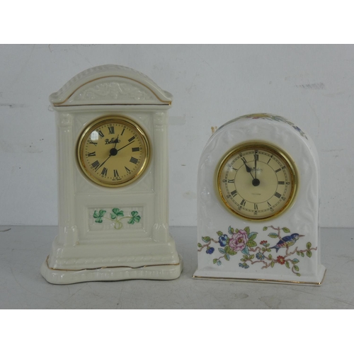 52 - A Belleek pottery mantle clock and an Aynsley 'Pembroke' mantle clock.