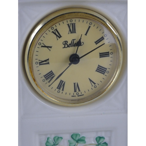 52 - A Belleek pottery mantle clock and an Aynsley 'Pembroke' mantle clock.