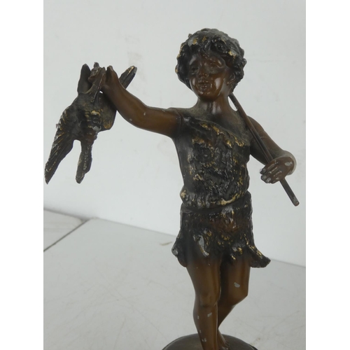 54 - A pair of vintage spelter figures and similar decorative ewer.