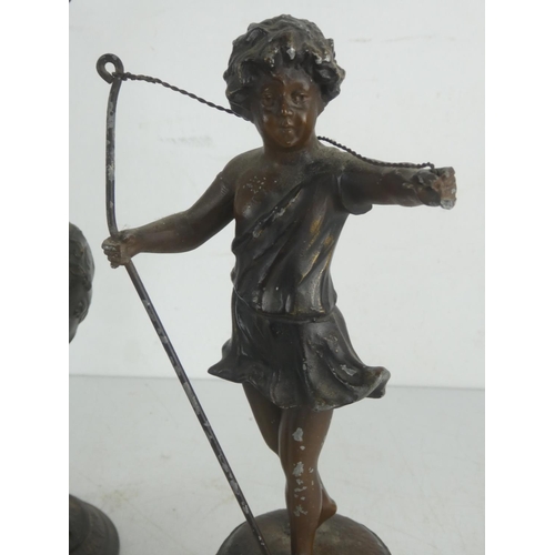 54 - A pair of vintage spelter figures and similar decorative ewer.