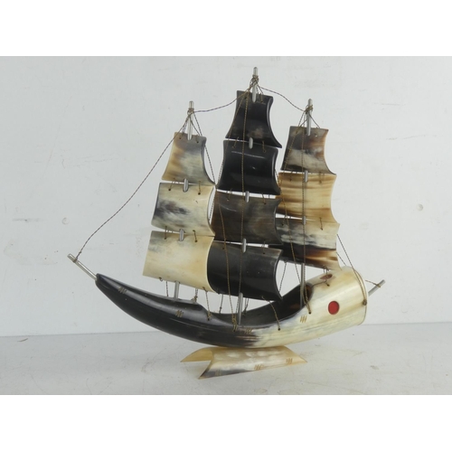 61 - A vintage ornamental ship made from horn.