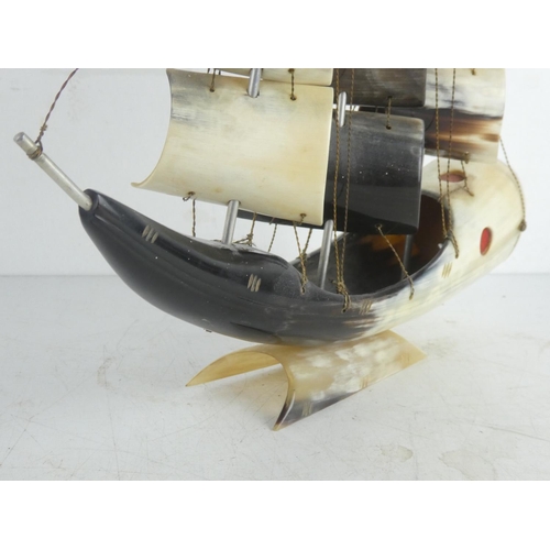 61 - A vintage ornamental ship made from horn.