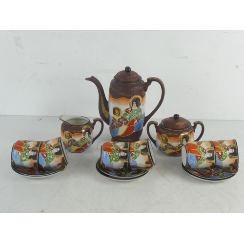 69 - A Japanese coffee set.