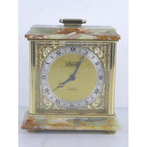 75 - A vintage Azizoff of London gilt and marble cased mantle clock.