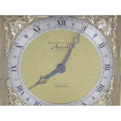 75 - A vintage Azizoff of London gilt and marble cased mantle clock.