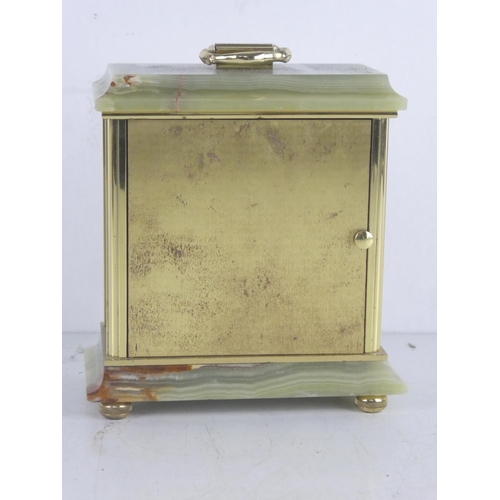 75 - A vintage Azizoff of London gilt and marble cased mantle clock.