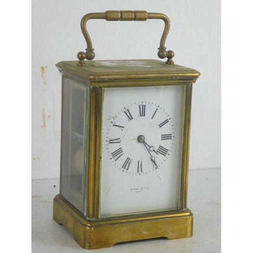 77 - An antique Paris carriage clock.