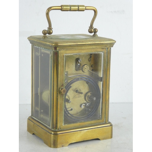 77 - An antique Paris carriage clock.