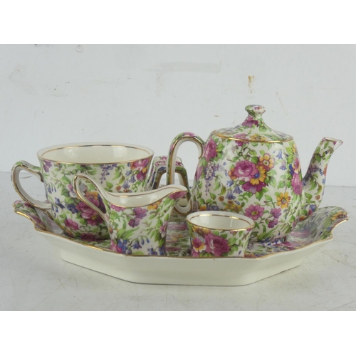 79 - A stunning Royal Winton 'Summertime' breakfast set (a/f chip on teapot spout).