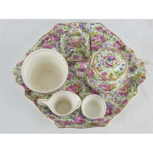 79 - A stunning Royal Winton 'Summertime' breakfast set (a/f chip on teapot spout).