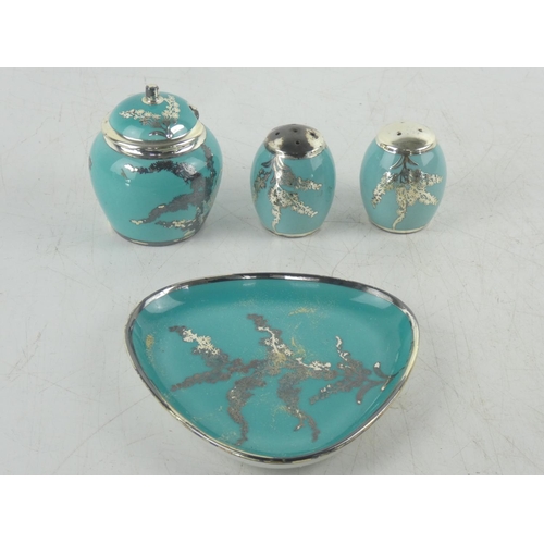 9 - A vintage Silberporzellan pottery condiment set.