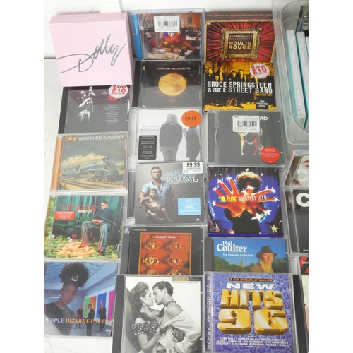 91 - A lot of assorted music cd's to include Adele, Bruce Springsteen, ABBA and more.