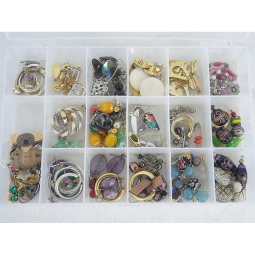 97 - A lot of assorted metal and costume earrings, brooches etc.