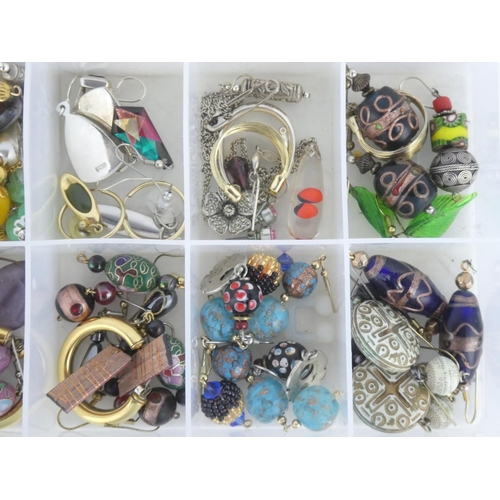 97 - A lot of assorted metal and costume earrings, brooches etc.