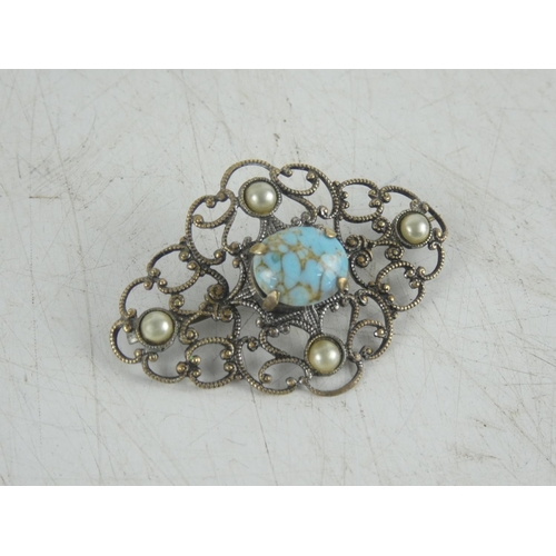 103 - A vintage pearl and turquoise metal brooch.