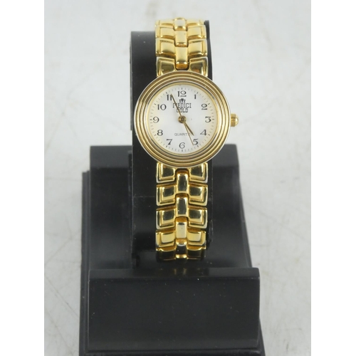 106 - A cased Medici Gold Quartz ladies wrist watch.