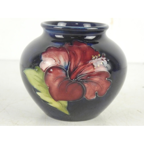 112 - A vintage Moorcroft pot.