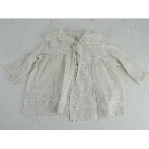 135 - A stunning antique Babies hand embroidered coat.